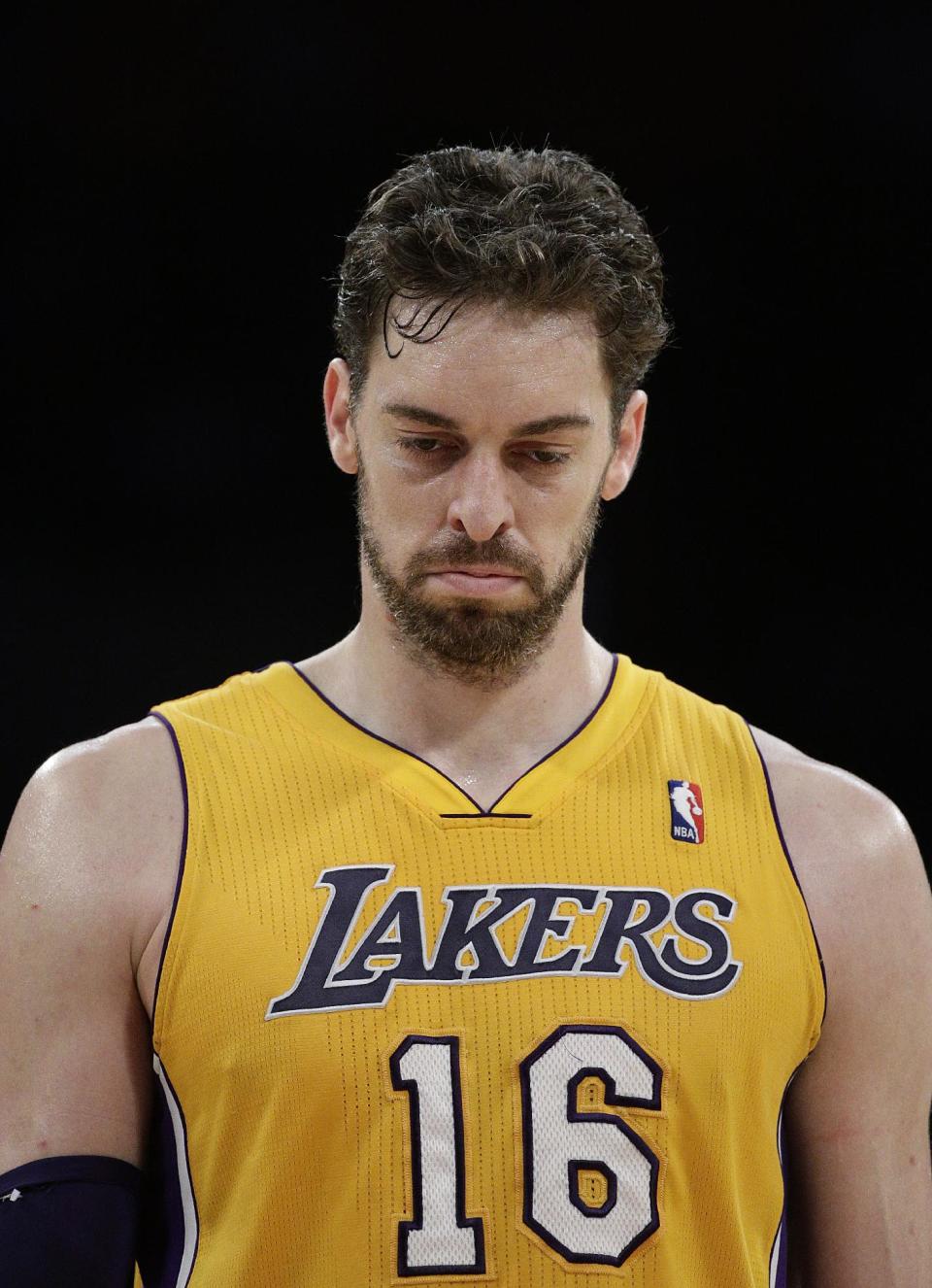 Los Angeles Lakers' Pau Gasol, of Spain, walks down the court during the first half of an NBA basketball game against the Los Angeles Clippers on Thursday, March 6, 2014, in Los Angeles. (AP Photo/Jae C. Hong)