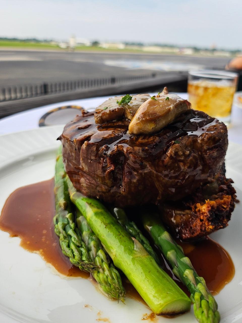 The filet can be topped with foie gras at Bistro Le Relais at Bowman Field airport in Louisville.