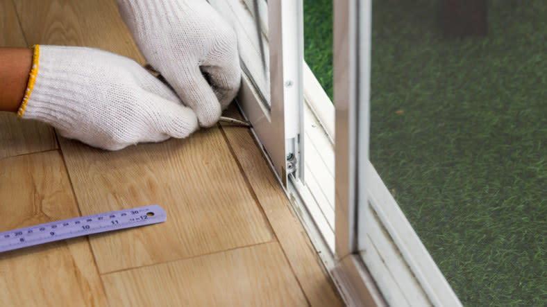 someone taking off the screen door