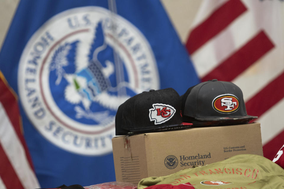 Counterfeit Super Bowl merchandise is displayed during a news conference on Monday, Feb. 5, 2024, in Las Vegas. Federal and local officials said they're taking steps to crimp counterfeiting, ground drones and curb human trafficking during Super Bowl week in Las Vegas. (AP Photo/Ty ONeil)