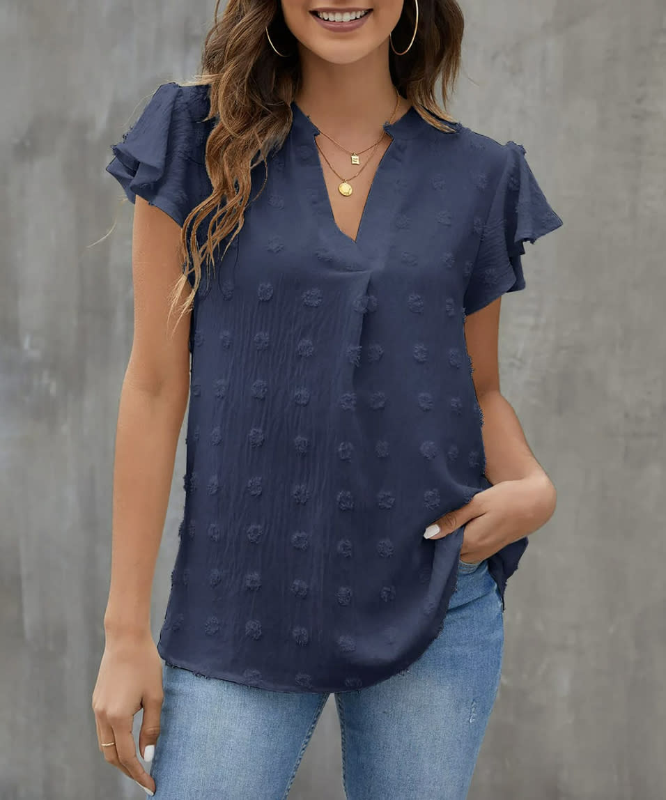 A navy ruffle blouse