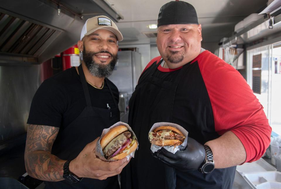 Pensacola Chef Edward Lordman and Big Moose manage the kitchen operation at the new Costello's Butcher Shop and Deli food truck on Wednesday, March 6, 2024.