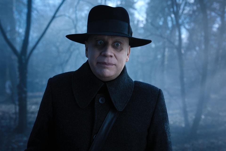 Wednesday. Fred Armisen as Uncle Fester in episode 107 of Wednesday. Cr. Vlad Cioplea/Netflix © 2022Wednesday