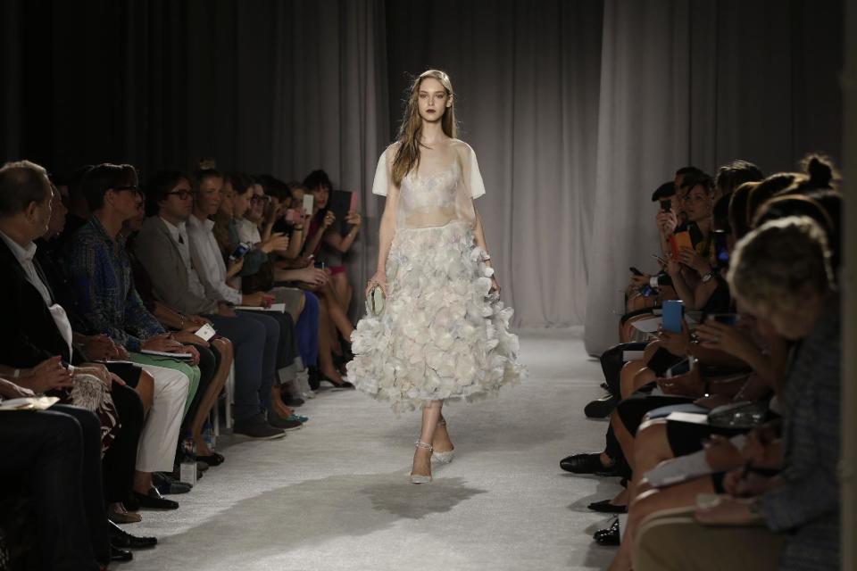 The Marchesa Spring 2014 collection is modeled during Fashion Week in New York, Wednesday, Sept. 11, 2013. (AP Photo/Seth Wenig)