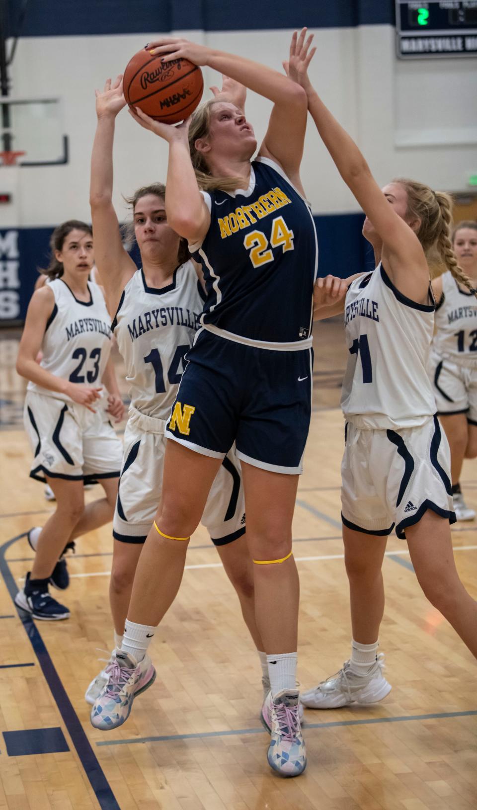 Port Huron Northern’s Jersey McGregor goes for a layup during a game earlier this season. The senior finished with a 12-point, 10-rebound double-double in the Huskies' 39-21 win over Grosse Pointe South on Tuesday.