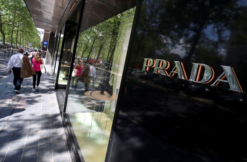 FILE PHOTO: A logo of luxury goods company Prada is seen at the entrance of a shop in Brussels