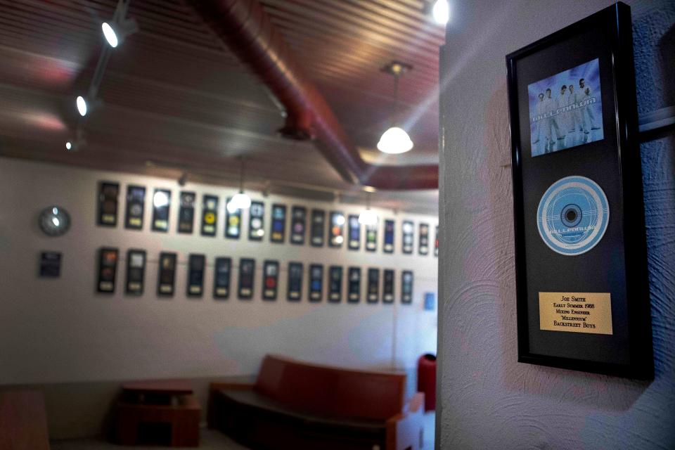 CD's hang on the wall displaying various musical artists that alumni from those who have attended the RecW recording workshop at the RecW on Jan. 12, 2023. The RecW is a recording workshop that teaches music recording and audio production. Students from around the world have been attending the workshop since 1977.