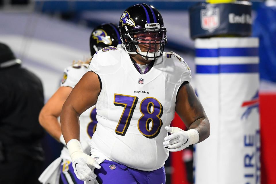 Baltimore Ravens offensive tackle Orlando Brown (78) jogs on the field prior to an AFC Divisional Round game against the Buffalo Bills at Bills Stadium.