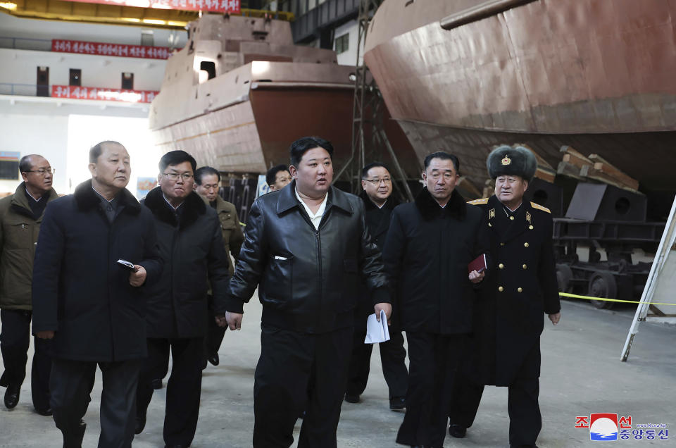 This undated photo provided on Feb. 2, 2024, by the North Korean government, North Korean leader Kim Jong Un, center, visits a shipyard in Nampho, North Korea. Independent journalists were not given access to cover the event depicted in this image distributed by the North Korean government. The content of this image is as provided and cannot be independently verified. Korean language watermark on image as provided by source reads: "KCNA" which is the abbreviation for Korean Central News Agency. (Korean Central News Agency/Korea News Service via AP)