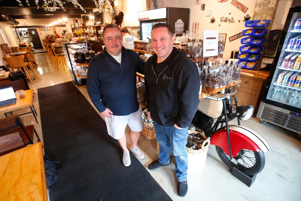 Co-owners Al Santos and Howie Mallowes at the newly opened New Beige Restaurant Bar & Market on Union Street in New Bedford.