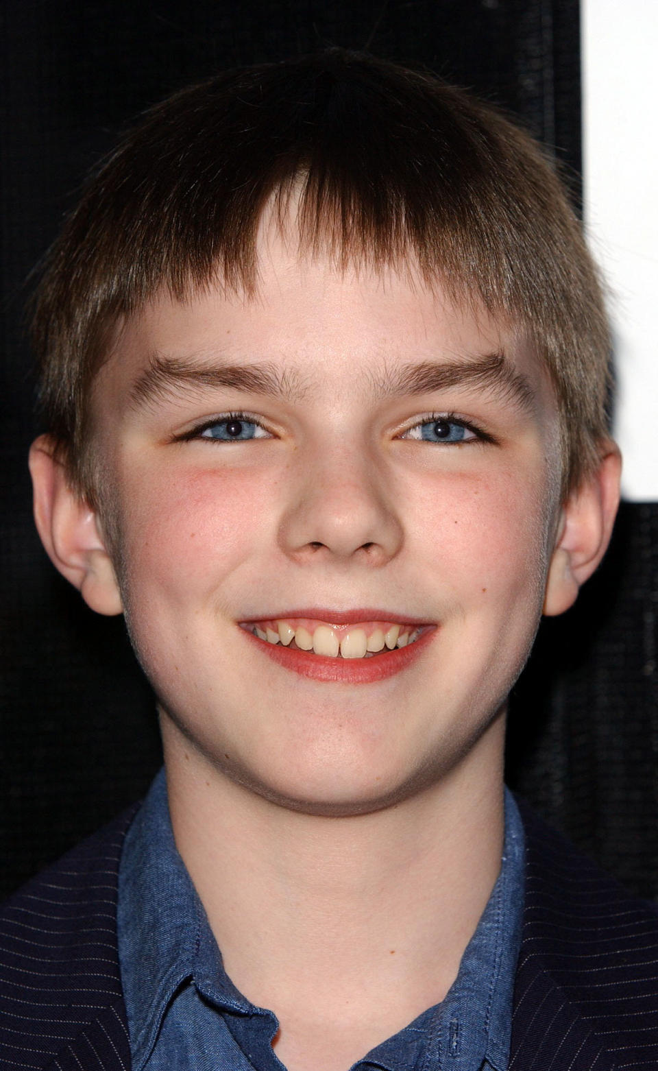 <strong>Then:</strong> As a 12-year-old, Nicholas got his big break playing Marcus in the big screen adaption of Nick Hornby's 'About A Boy'. 