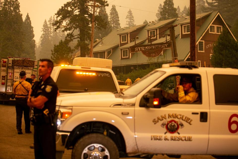 Fire trucks and crews outside the Strawberry Lodge