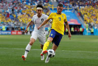 <p>Sweden’s Marcus Berg keeps possession from South Korea’s Lee Yong (REUTERS/Carlos Barria) </p>