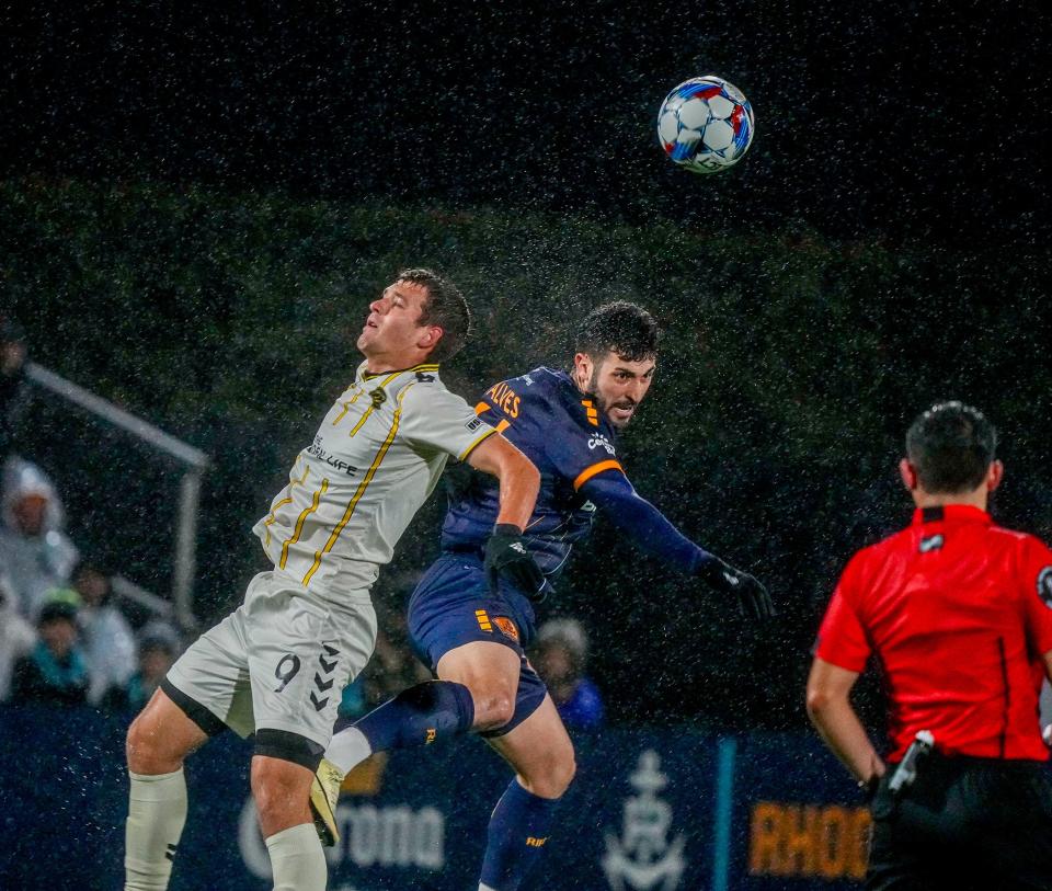 Rhode Island FC defender Gabriel Alves heads the ball during the game against Charleston Battery on Saturday night.