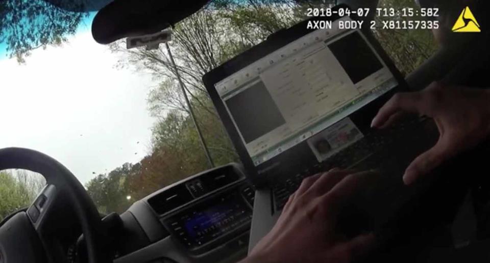 The officers decide whether to arrest the driver over the flip of a coin on one of their mobile phones. Source: CBS Philadelphia