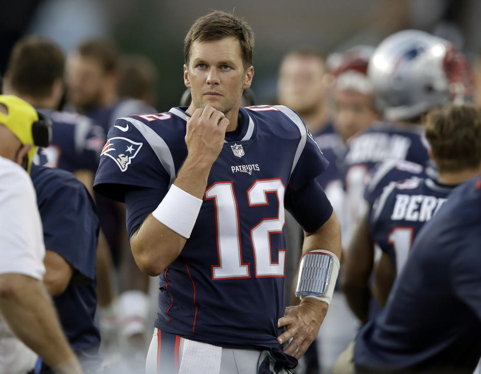 New England Patriots quarterback Tom Brady watches from the sideline during the first half of a preseason NFL football game against the Washington Redskins, Thursday, Aug. 9, 2018, in Foxborough, Mass. (AP Photo/Charles Krupa)