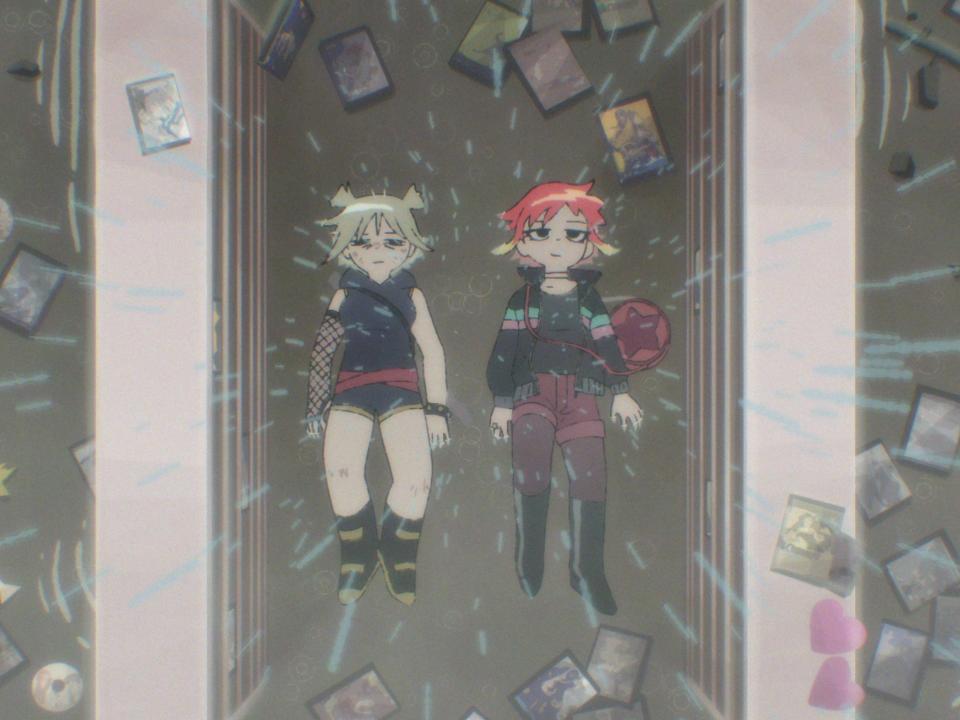 roxie richter and ramona flowers in the scott pilgrim anime, lying on the floor of a DVD rental store with cases scattered around them as rain falls