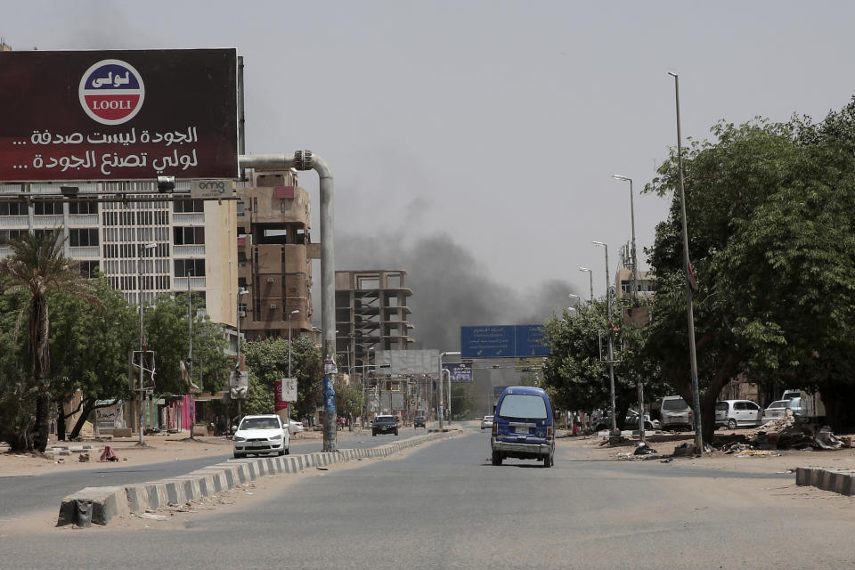 Smoke is seen rising from a neighborhood in Khartoum, Sudan, Saturday, April 15, 2023. Fierce clashes between Sudan’s military and the country’s powerful paramilitary erupted in the capital and elsewhere in the African nation after weeks of escalating tensions between the two forces. The fighting raised fears of a wider conflict in the chaos-stricken nation. (AP Photo/Marwan Ali)