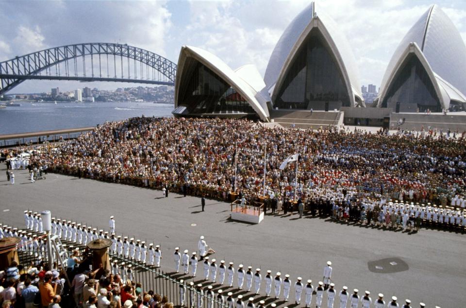 The Sydney Opera House, with the Harbour Bridge in the background, during the Queen’s 1977 visit to Australia (Ben Roll/PA) (PA Wire)