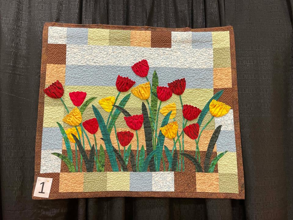 Made by Mary Beth Hallahan, this 3-D Tulip Wall Hanging was a crowd favorite at the Town of Farragut Quilt Show.