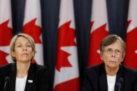 Transportation Safety Board Director of Investigations (Air) Natacha Van Themsche and TSB Chair Kathy Fox take part in a news conference in Ottawa