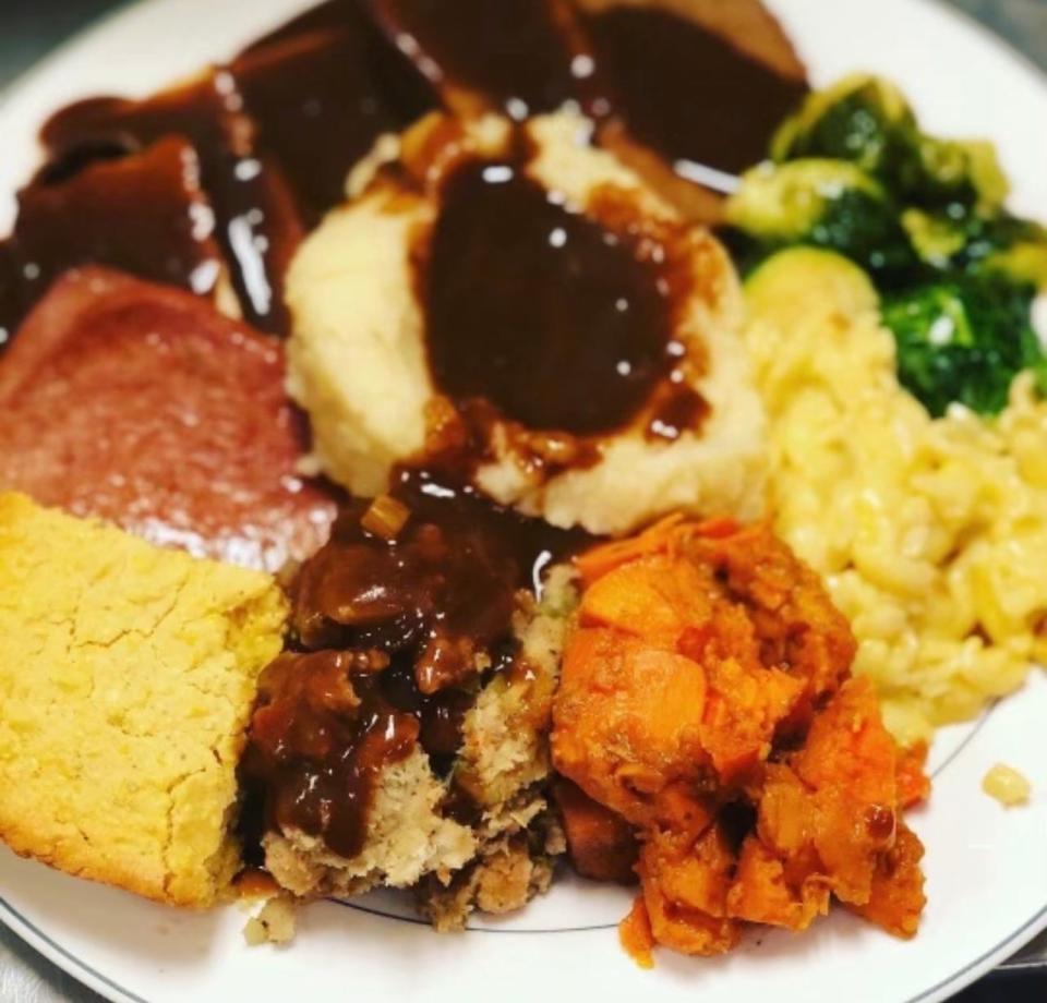 A fully vegan Thanksgiving plate from Kaya's Kitchen in Belmar, including yams, stuffing, mashed potatoes and gravy, corn bread, as well as meat substitutes like vegan ham, turkey and "celebration roast."