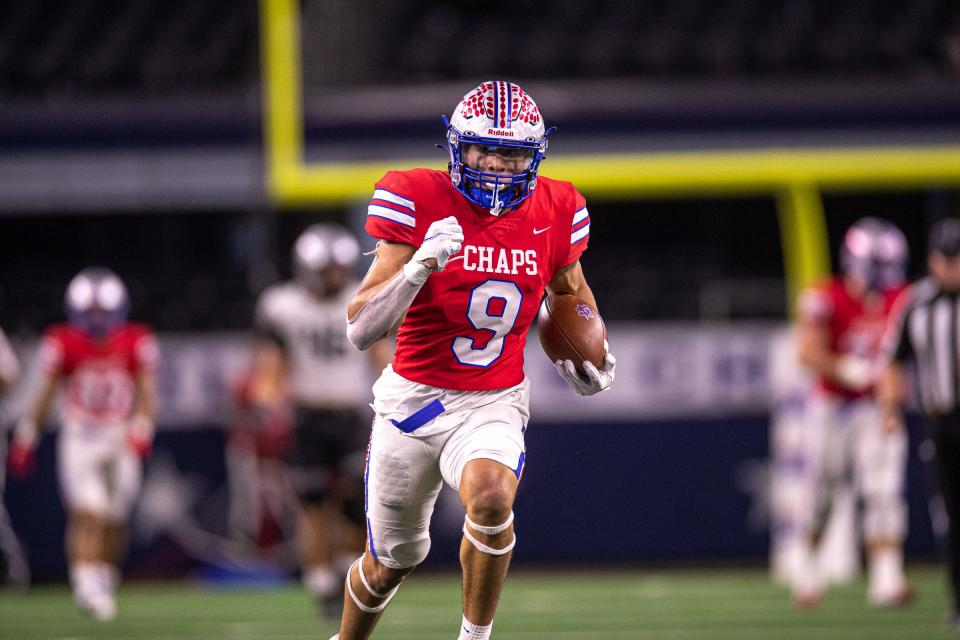 Westlake receiver Jaden Greathouse sprints toward the end zone during the Chaparrals' win over Denton Guyer in the 2021 Class 6A Division II state championship game. A Notre Dame pledge, Greathouse was recently named to MaxPreps' preseason All-America team.