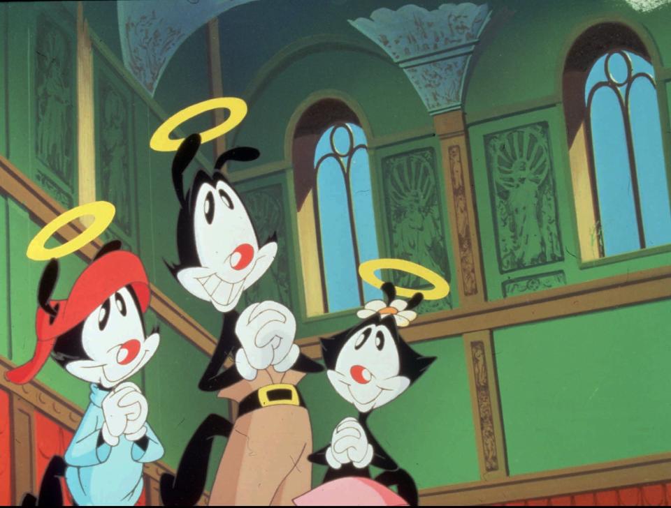 Cartoon characters the Warner Brothers and their sister Dot appear in an episode of "Animaniacs."
'