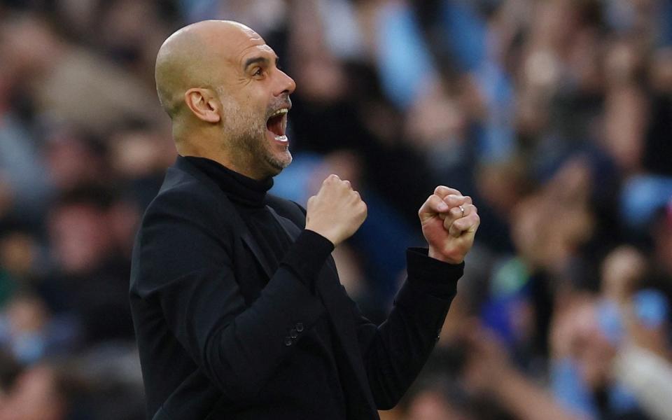 Manchester City manager Pep Guardiola celebrates their first goal scored by Bernardo Silva - Reuters/Molly Darlington