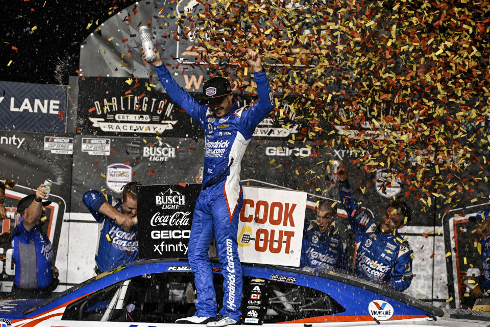 Kyle Larson celebrates in Victory Lane after winning a NASCAR Cup Series auto race at Darlington Raceway, Sunday, Sept. 3, 2023, in Darlington, S.C. (AP Photo/Matt Kelley)