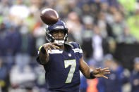 Seattle Seahawks quarterback Geno Smith throws against the New Orleans Saints during the first half of an NFL football game, Monday, Oct. 25, 2021, in Seattle. (AP Photo/John Froschauer)