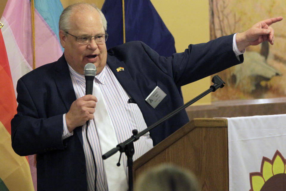 Tom Witt, the executive director of the LGBTQ-rights group Equality Kansas, speaks at a rally inside the Statehouse Monday, March 7, 2022 in Topeka, Kan. Witt is a key reason Kansas has not yet banned transgender athletes from girls' and women's sports in schools and colleges. (AP Photo/John Hanna)