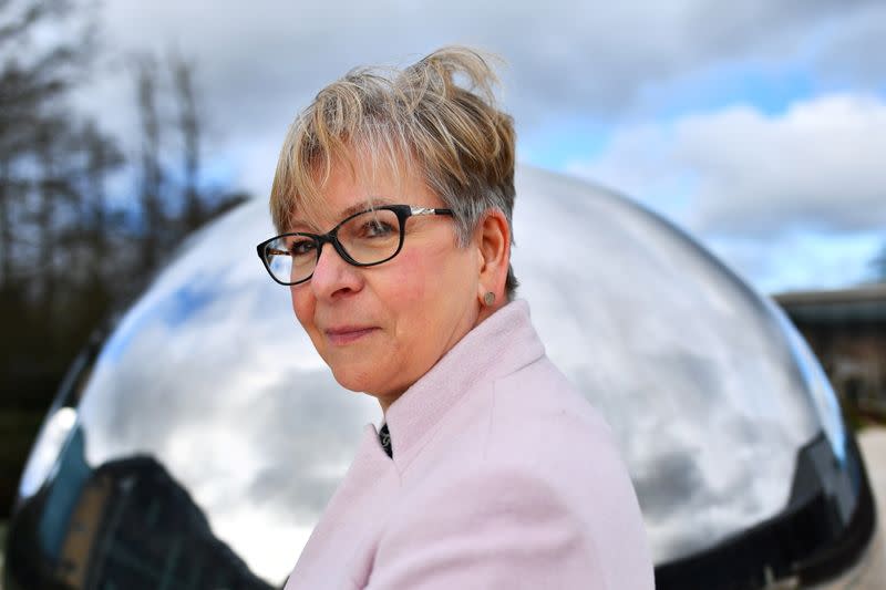 Sharon Peacock, who heads COVID-19 Genomics UK, poses for a portrait in Cambridge