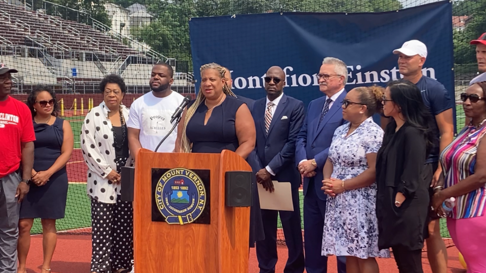 Mayor Shawyn Patterson-Howard announcing $25,000 sponsorship by Montefiore Einstein for the upcoming Mount Vernon Track & Field Twilight Series, the city's first organized track meets in more than 30 years. Behind her in the white t-shirt is Sherlon Bacchus of the Project Achilles track club and in the sunglasses Reginald Jordan, the vice president and executive director of Montefiore Mount Vernon Hospital.