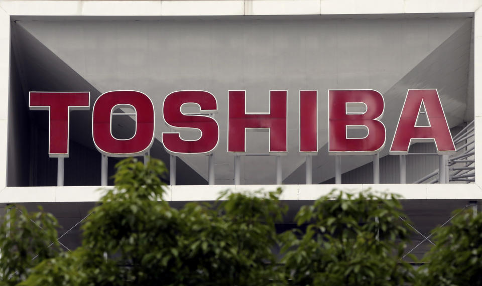 FILE - This May 26, 2017, file photo shows the company logo of Toshiba Corp. displayed in front of its headquarters in Tokyo. Toshiba Corp. has brushed off a new missive from CVC Partners about the global fund's interest in acquiring the Japanese manufacturer. Toshiba said Tuesday that a letter from CVC was “not possible to evaluate.” (AP Photo/Koji Sasahara, File)