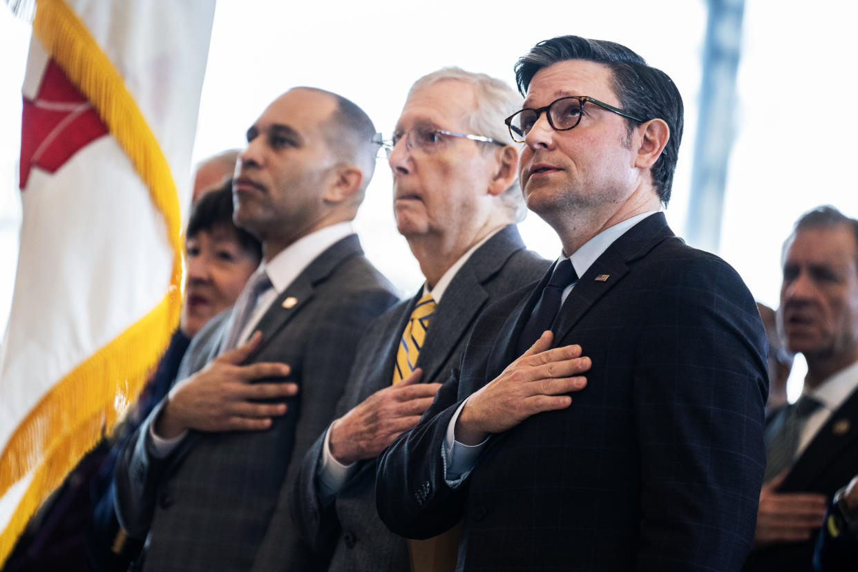 UNITED STATES - MARCH 21: From right, Speaker of the House Mike Johnson, R-La., Senate Minority Leader Mitch McConnell, R-Ky., House Minority Leader Hakeem Jeffries, D-N.Y., and Sen. Susan Collins, R-Maine, watch the presentation of the colors during a Congressional Gold Medal Ceremony to honor World War II veterans of the 23rd Headquarters Special Troops and the 3133rd Signal Services Company, known as the Ghost Army, during a ceremony in Emancipation Hall on Thursday, March 21, 2024. The veterans honored were Bernie Bluestein, Seymour Nussenbaum, and John Christman.  (Tom Williams/CQ-Roll Call, Inc via Getty Images)