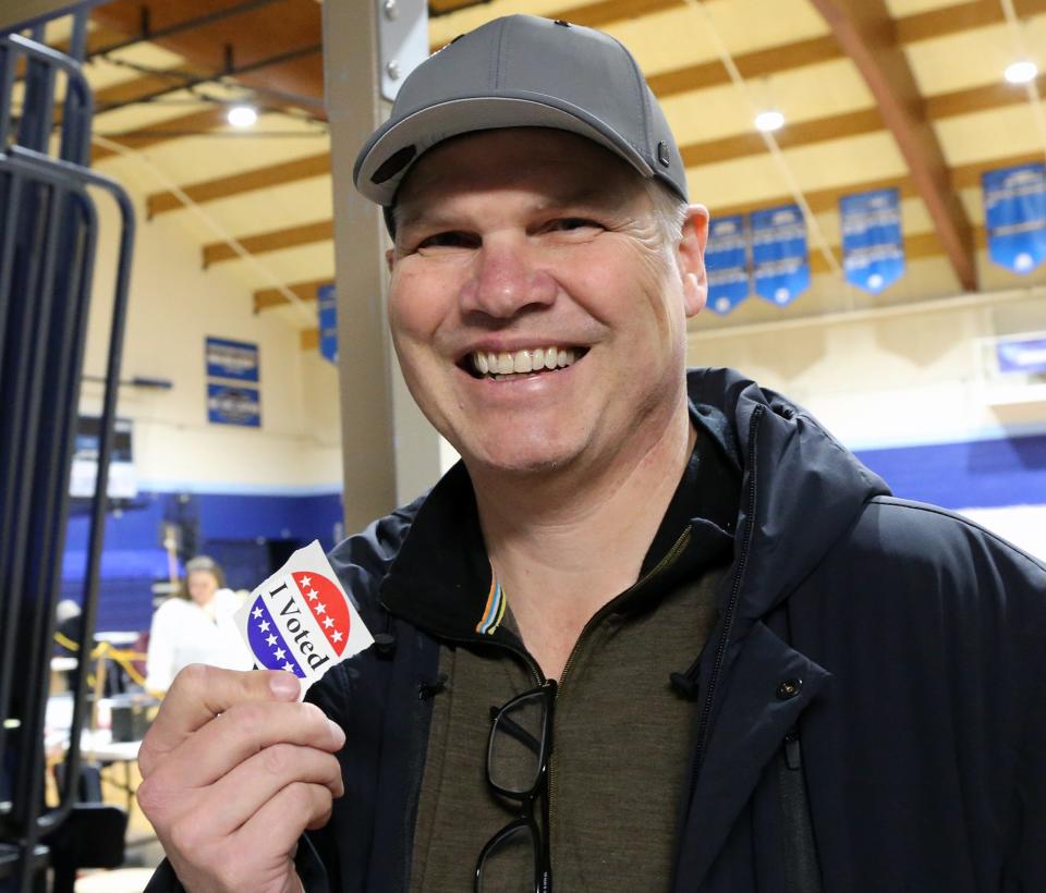 Scott Jacoby of York holds up his "I voted" sticker proudly after he says he voted for Nikki Haley on Tuesday, March 5, 2024.