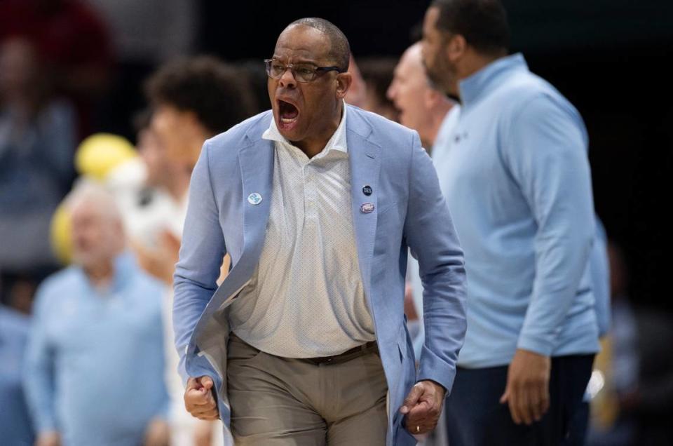 North Carolina coach Hubert Davis reacts as his team takes a first-half lead against Michigan State during the second round of the NCAA Tournament at the Spectrum Center in Charlotte, N.C., on Saturday, March 23, 2024