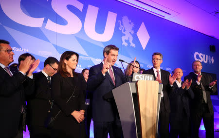 Bavarian State Prime Minister Markus Soeder of the Christian Social Union Party (CSU) reacts after first exit polls in the Bavarian state election in Munich, Germany, October 14, 2018. REUTERS/Michael Dalder