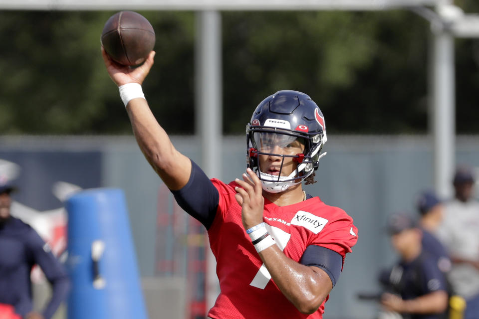 Houston Texans quarterback C.J. Stroud passes the ball during the NFL football team's training camp Thursday, July 27, 2023, in Houston. (AP Photo/Michael Wyke)