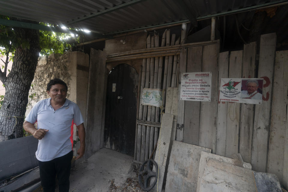 Jose Antonio Leon Mendez gives an interview outside his home in the October 2 squatter settlement where he is the leader in Tulum, Quintana Roo state, Mexico, Thursday, August 4, 2022. Mendez, a welder who has lived in Cancun and Tulum for about three decades, says the settlement represents a last stand for Mexicans are being priced out of their own coast. (AP Photo/Eduardo Verdugo)