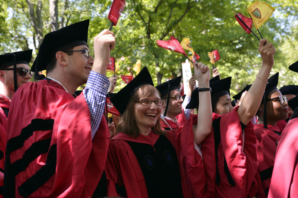 CAMBRIDGE, MA - MAY 24:  Students attend at the Harvard University 2018 367th Commencement exercises at Harvard University on May 24, 2018 in Cambridge, Massachusetts.  Receiving Honorary Degrees in 2018 are Sallie Chisholm, Rita Dove, Harvey Fineberg, Ricardo Lagos, George Lewis, Twyla Tharp and Wong Kar Wai. Representative John Lewis also attended.  (Photo by Paul Marotta/Getty Images)