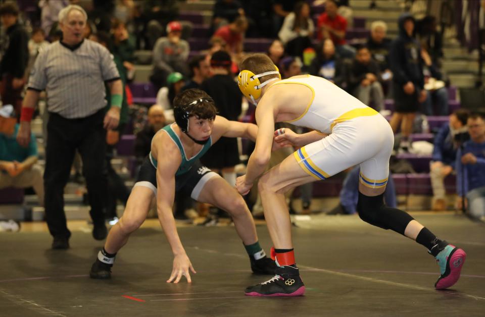 Thomas Looby from Brewster on his way to defeating Charles Przymyiski from Mahopac in the 116 pound weight class, during the 2024 Murphy-Guccione Shoreline Wrestling Classic at New Rochelle High School, Jan. 6, 2024.