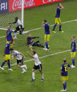 <p>Germany players reacts after their teammate Toni Kroos scores his side’s second goal during the group F match between Germany and Sweden. </p>