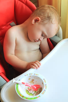 <span class="caption">The nervous system is what makes you feel tired after dinner.</span> <span class="attribution"><a class="link " href="https://www.shutterstock.com/image-photo/tired-baby-boy-sleeping-highchair-after-450823195?src=dTtJ8zpfyMg6dGA-6v41oQ-1-3" rel="nofollow noopener" target="_blank" data-ylk="slk:Shutterstock;elm:context_link;itc:0;sec:content-canvas">Shutterstock</a></span>