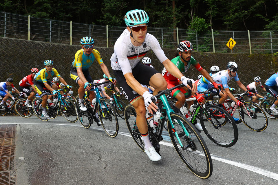 OYAMA, JAPAN - JULY 24: (L-R) Dmitriy Gruzdev of Team Kazakhstan, Nikias Arndt of Team Germany & Mohcine El Kouraji of Team Morocco during the Men's road race at the Fuji International Speedway on day one of the Tokyo 2020 Olympic Games on July 24, 2021 in Oyama, Shizuoka, Japan. (Photo by Tim de Waele/Getty Images)