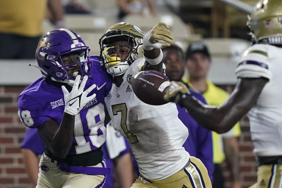 Georgia Tech defensive back Zamari Walton (7) knocks away a pass to Western Carolina wide receiver Malik Knight (18) during the second half of an NCAA college football game Saturday, Sept. 10, 2022, in Atlanta. (AP Photo/Brynn Anderson)