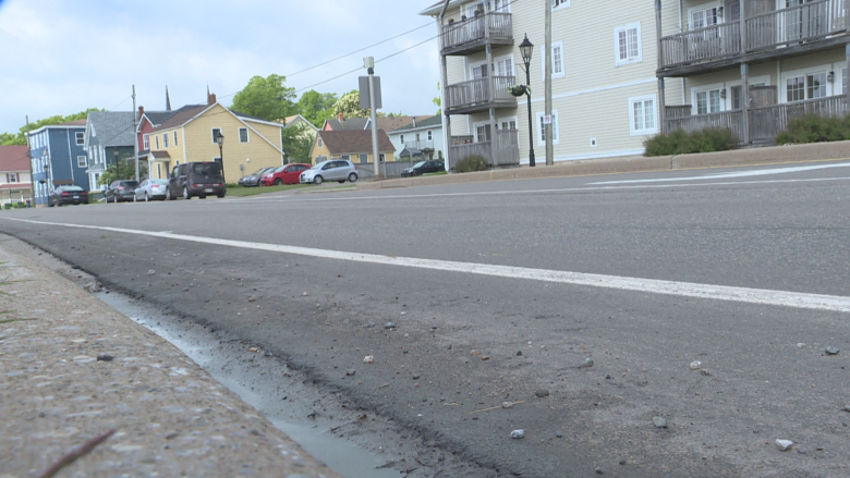 Police monitoring trucks transporting loose gravel in Charlottetown