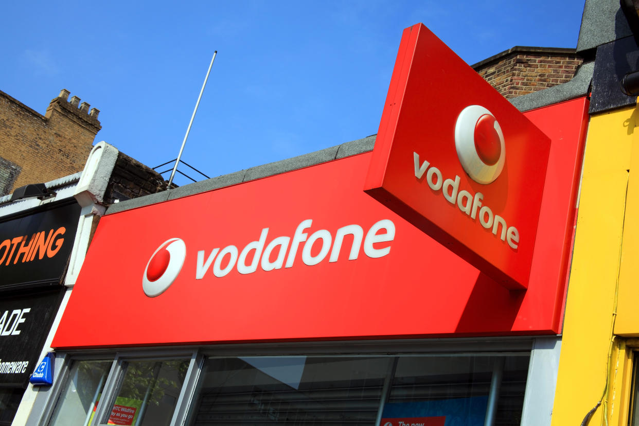 London, United Kingdom, April 17, 2011: Vodaphone logo advertising sign on one of its branch retail outlets in Notting Hill.