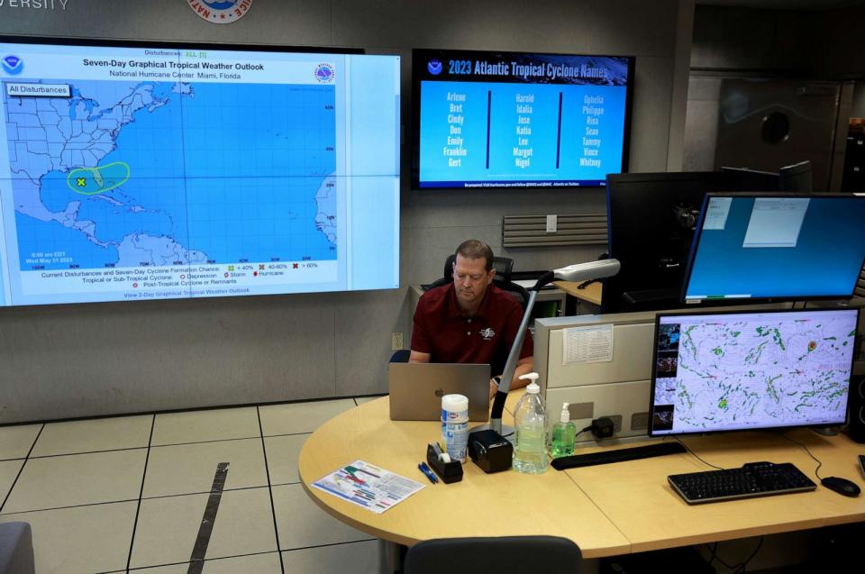 PHOTO: Daniel Brown, Senior Hurricane Specialist, works on tracking unsettled weather over the eastern Gulf of Mexico on May 31, 2023 in Miami, Florida. (Joe Raedle/Getty Images)